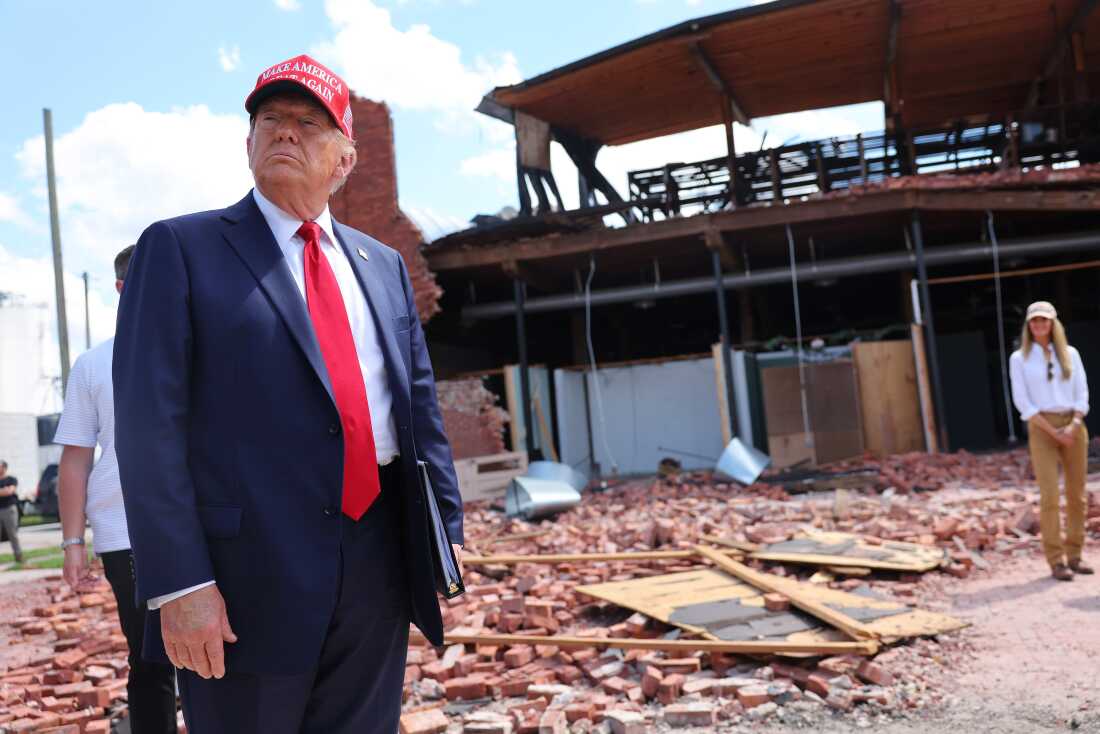 Former President Donald Trump visits a furniture store damaged during Hurricane Helene in Valdosta, Ga., September 30.