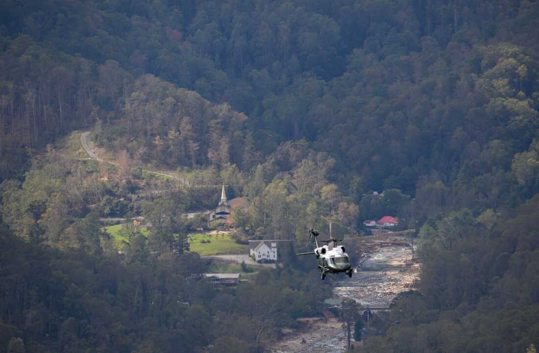 President Biden surveys storm damage at Marine One near Asheville, NC on October 2, 2024. The death toll from powerful hurricane Helene, which hit the southeastern United States, has risen to at least 155, authorities said on October 1. (Photo by Mandel NGAN/AFP) (Photo by MANDEL NGAN/AFP via Getty Images)