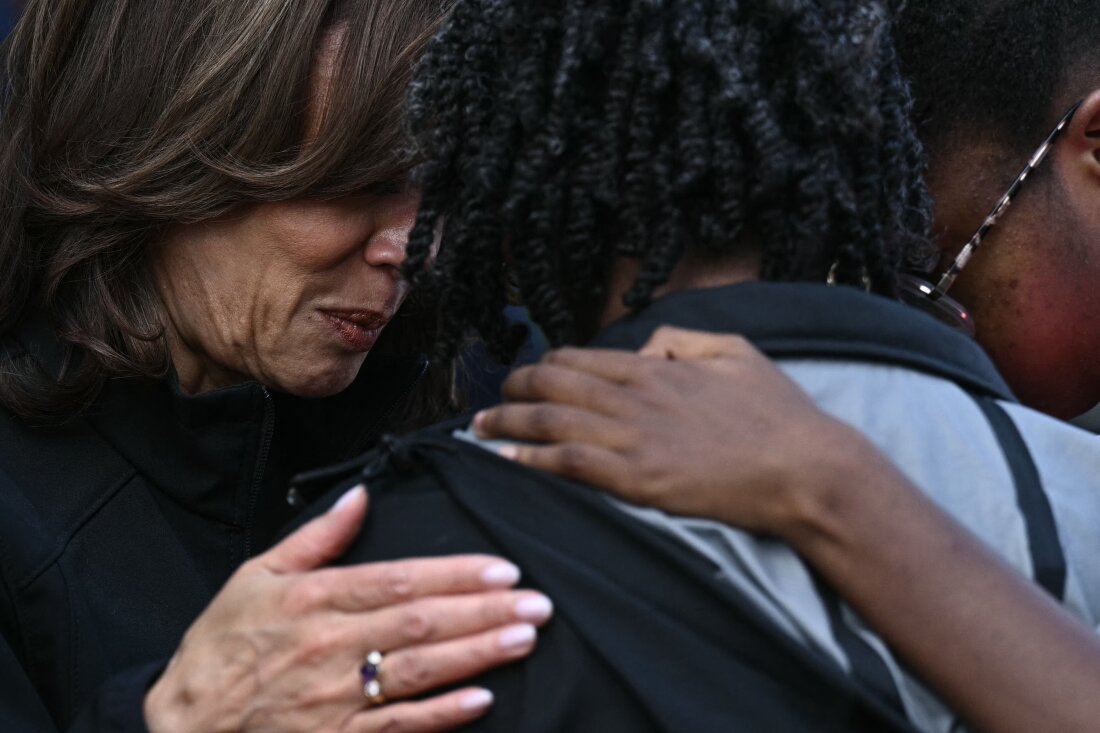 Vice President Harris comforts a woman when she toured the damage from Hurricane Helene in the Meadowbrook neighborhood of Augusta, Ga., October 2.